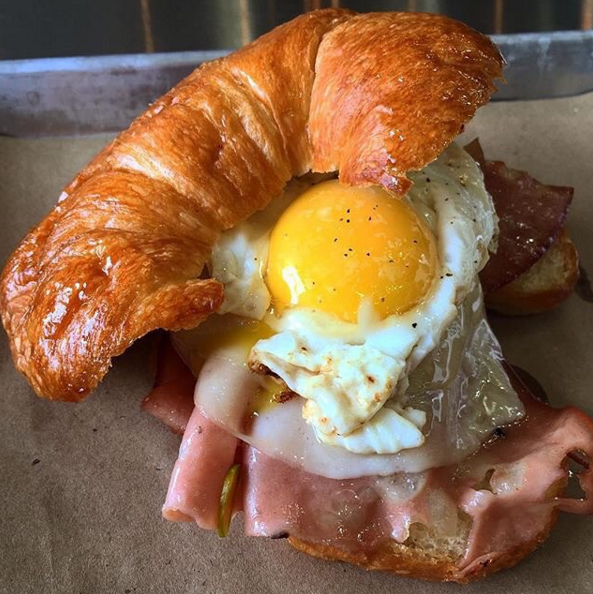 The Jenneca breakfast sandwich at Brusco | Instagram @eatbrusco
