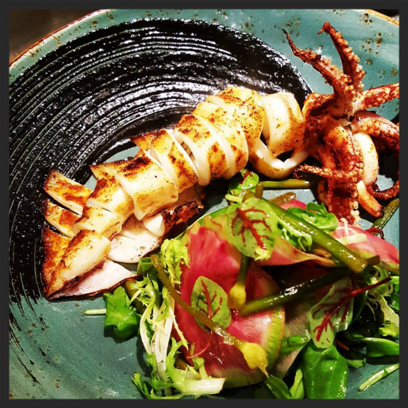 Grilled calamari salad at Catch | Instagram, @chefjohnbeatty