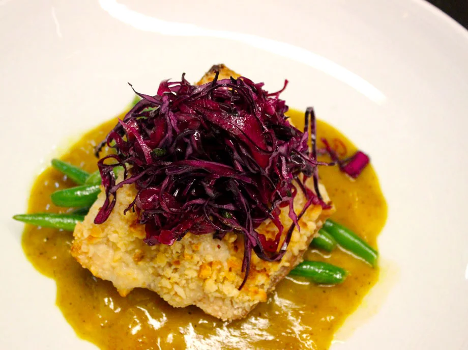 Macadamia crusted mahi, coconut curry sauce, red cabbage ginger slaw, flashed haricot verts at Canyon Restaurant | Credit: Instagram @canyonsouthwest