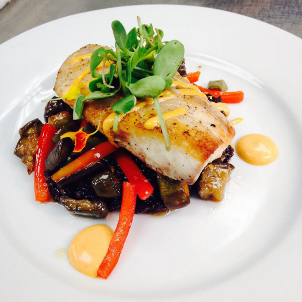 LA black drum, sorghum and vinegar sautéed eggplant & red pepper, Carolina black rice with chili aioli | Instagram @angeline_nola