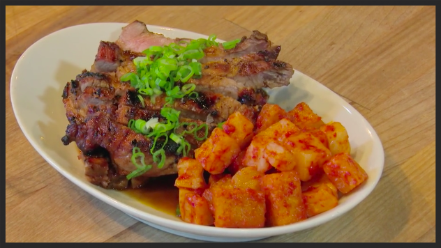 Grilled pork shoulder steak