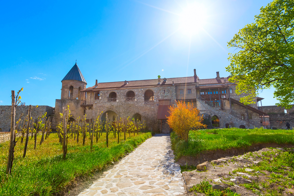 Alaverdi orthodox monastery and vineyard in Kakhetia region in Eastern Georgia | Shutterstock