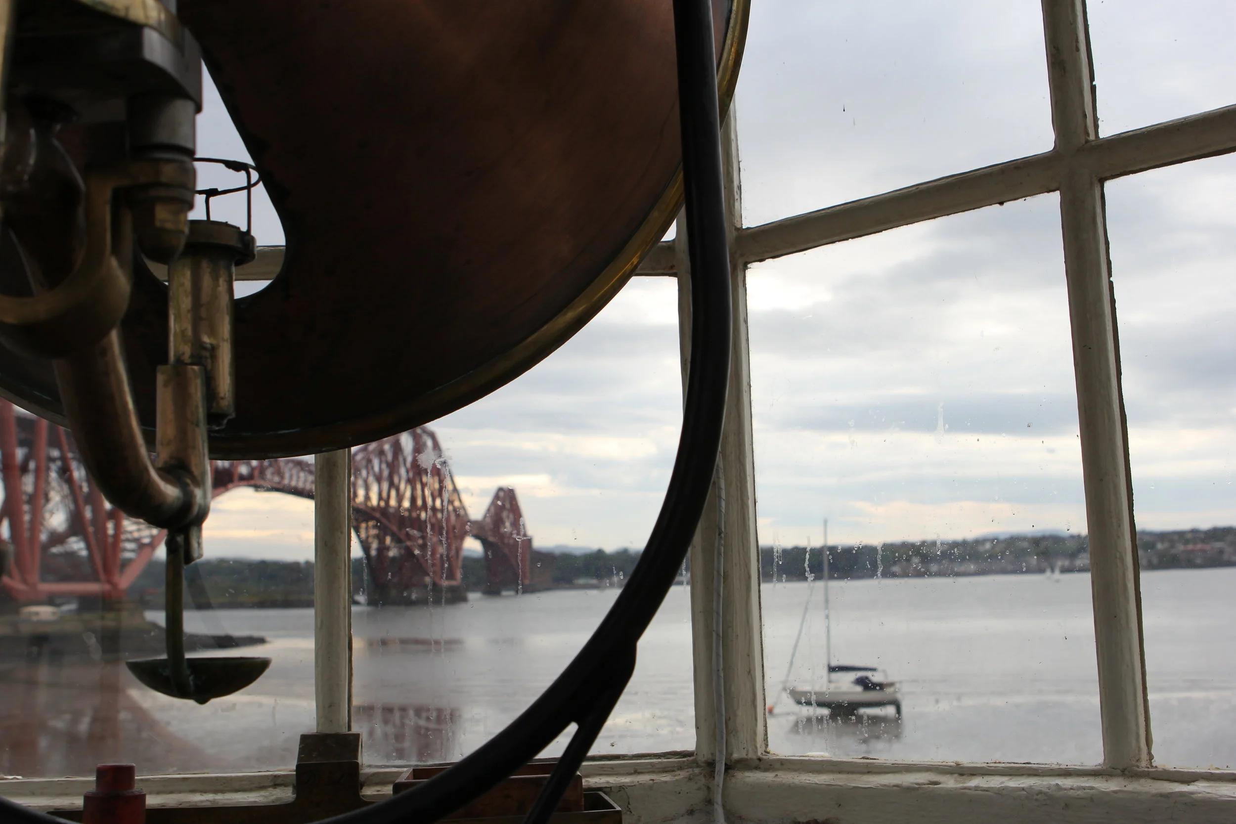 South Queensferry, Scotland. In the old lighthouse, Hawes Pier Bracon, looking at Forth Bridge. Both built in the 1800s.