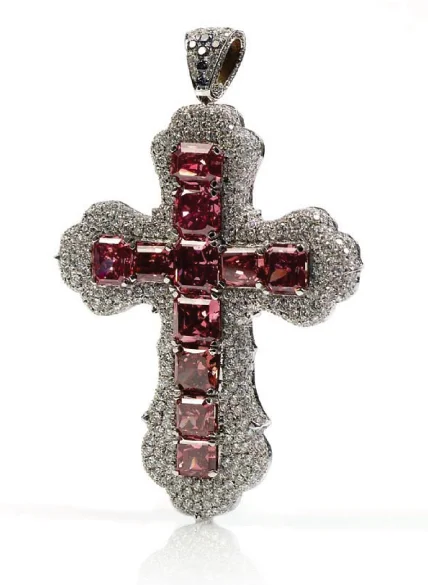Image: The Red Wonder Cross. It was designed by Oren Seren, Master Diamond Cutter of Seren Diamonds, and features 11 fancy red diamonds (0.42-0.93 carats), as well as colorless and blue diamonds, set in white gold. Source: http://www.serendiamonds.com/