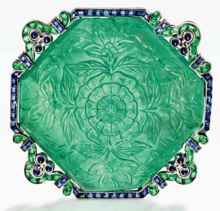 The carved emerald dates from the late-17th to early-18th century, and was set within the elegant and understated mounting by Cartier in the 1920s. Photo: Sotheby's
