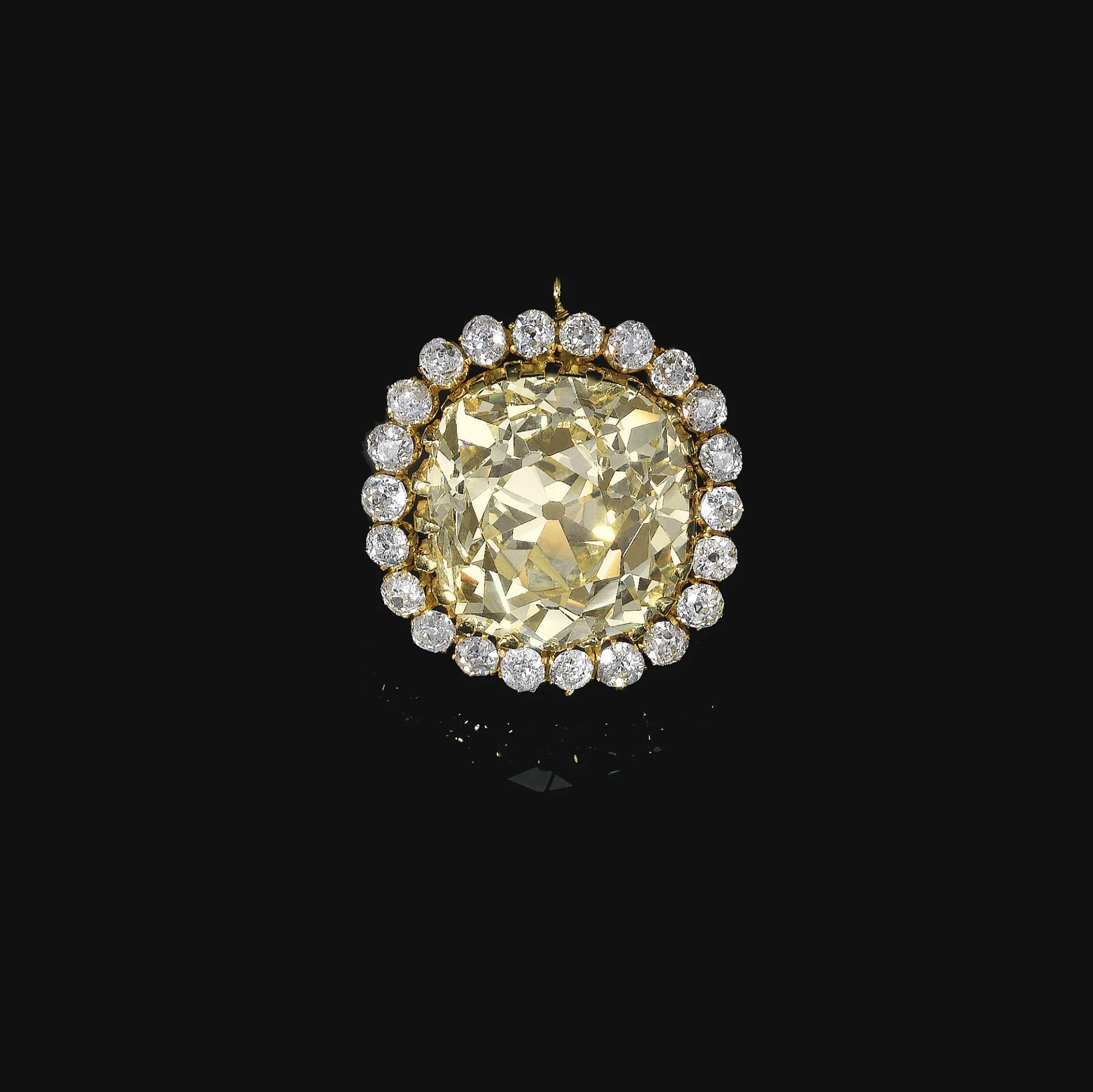 74.53 carat cushion cut fancy yellow diamond, set in a jewel from the late 19th century. A Qajar Dynasty diamond and jewel. Image: Sotheby's