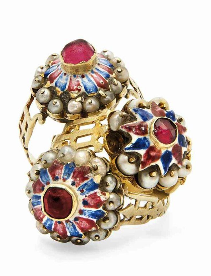 Three Qajar Enamelled Gold Rings, 19th century. Image: Christies