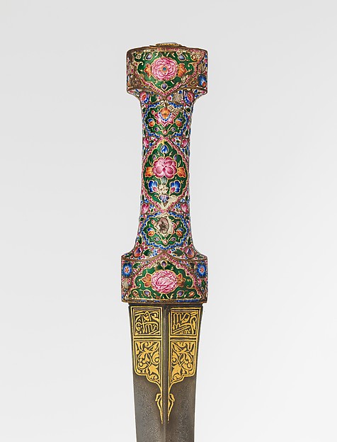 Detail: Dagger (Khanjar) with Sheath, 19th century, Qajar, Persia. Image: The Metropolitan Museum of Art. Medium: Steel, gold, gemstone, copper, enamel, wood