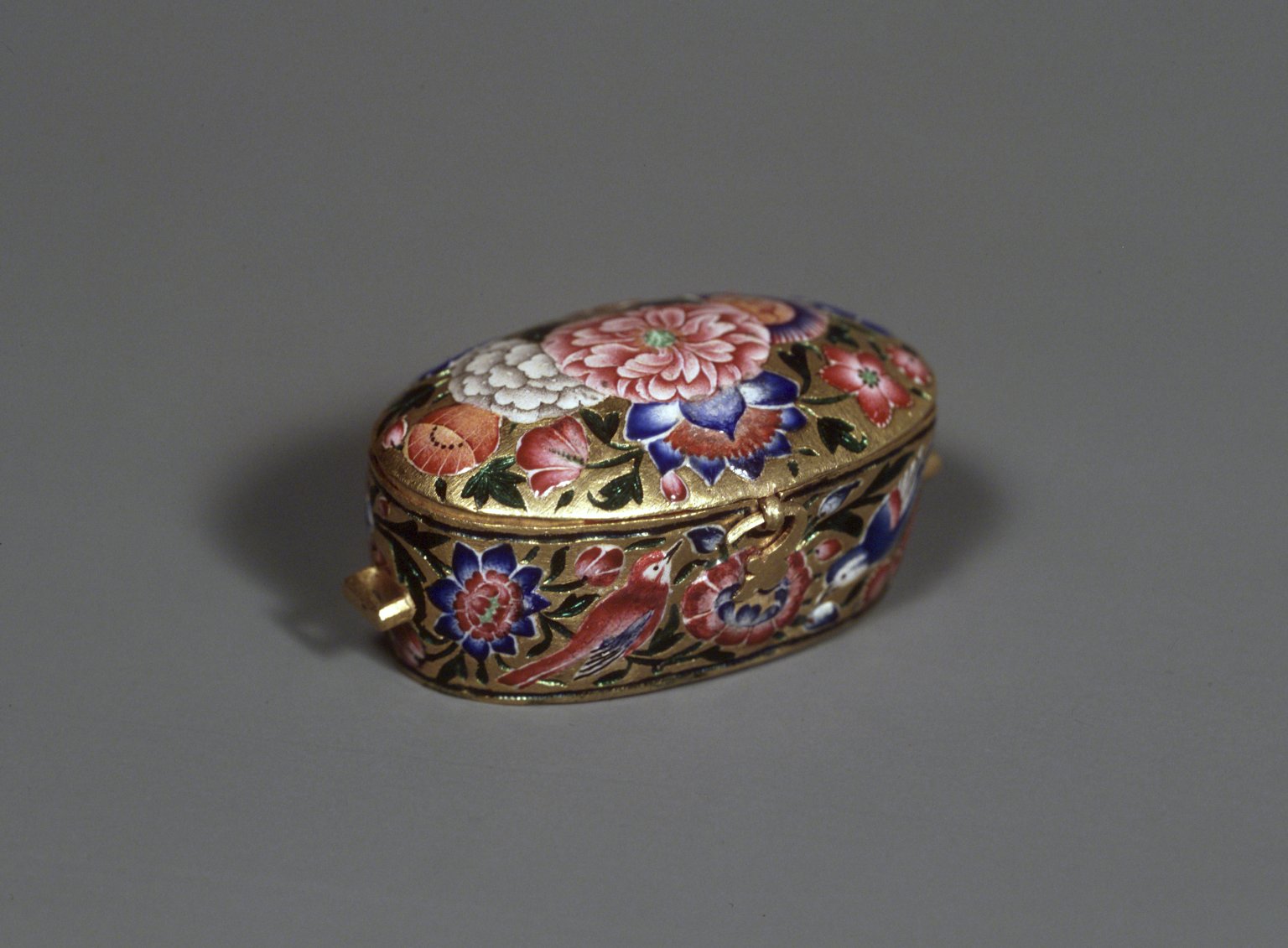 Amulet Box, 19th century. Gold, polychrome enamel, and repoussé decoration, 7/8 x 1 7/8 in., 0.1 lb. (2.3 x 4.8 cm). Image: Brooklyn Museum
