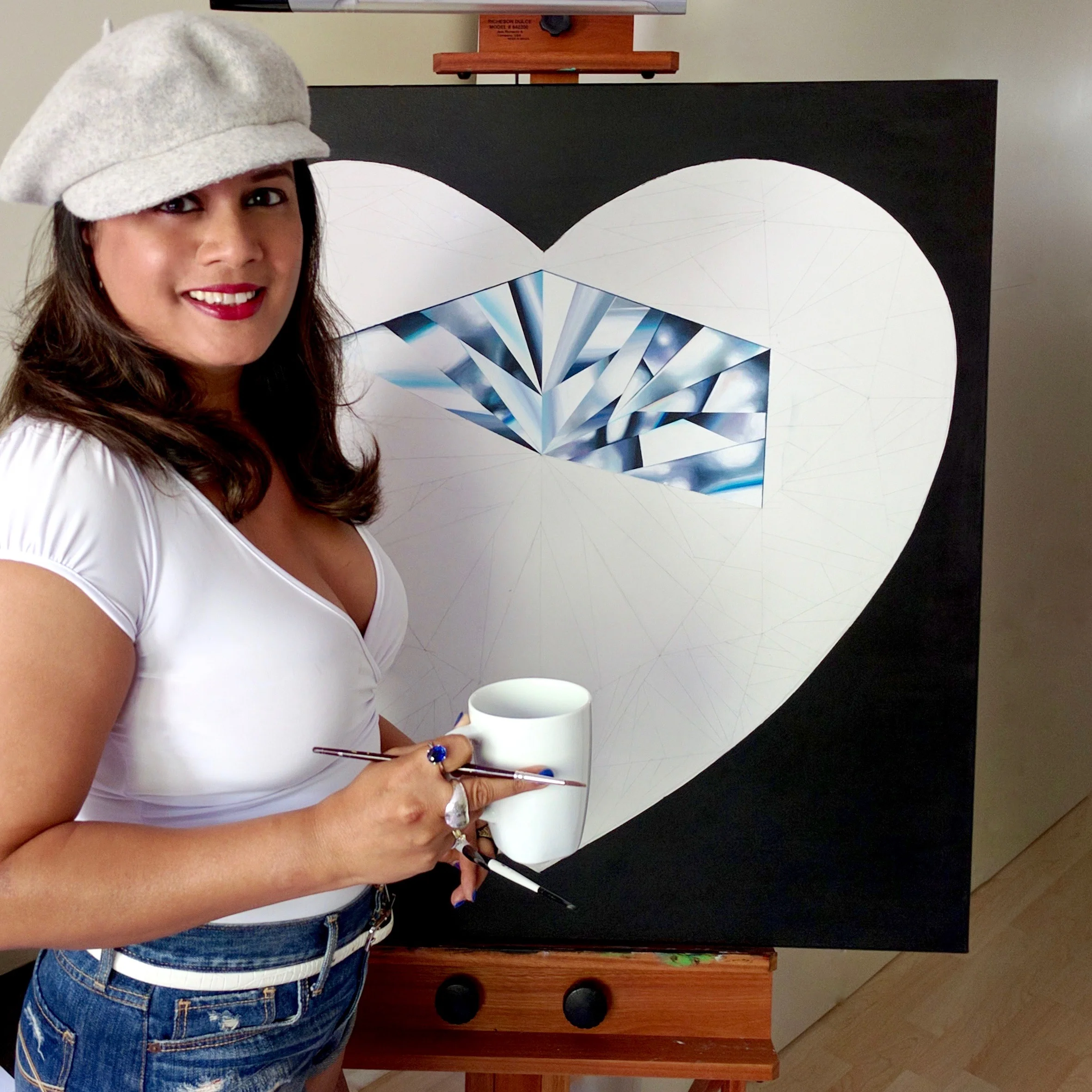 A pure heart is pure light! It's that essence I want to capture in my painting. After all, what is heart without story? Reena Ahluwalia in her studio working on the painting. ©Reena Ahluwalia