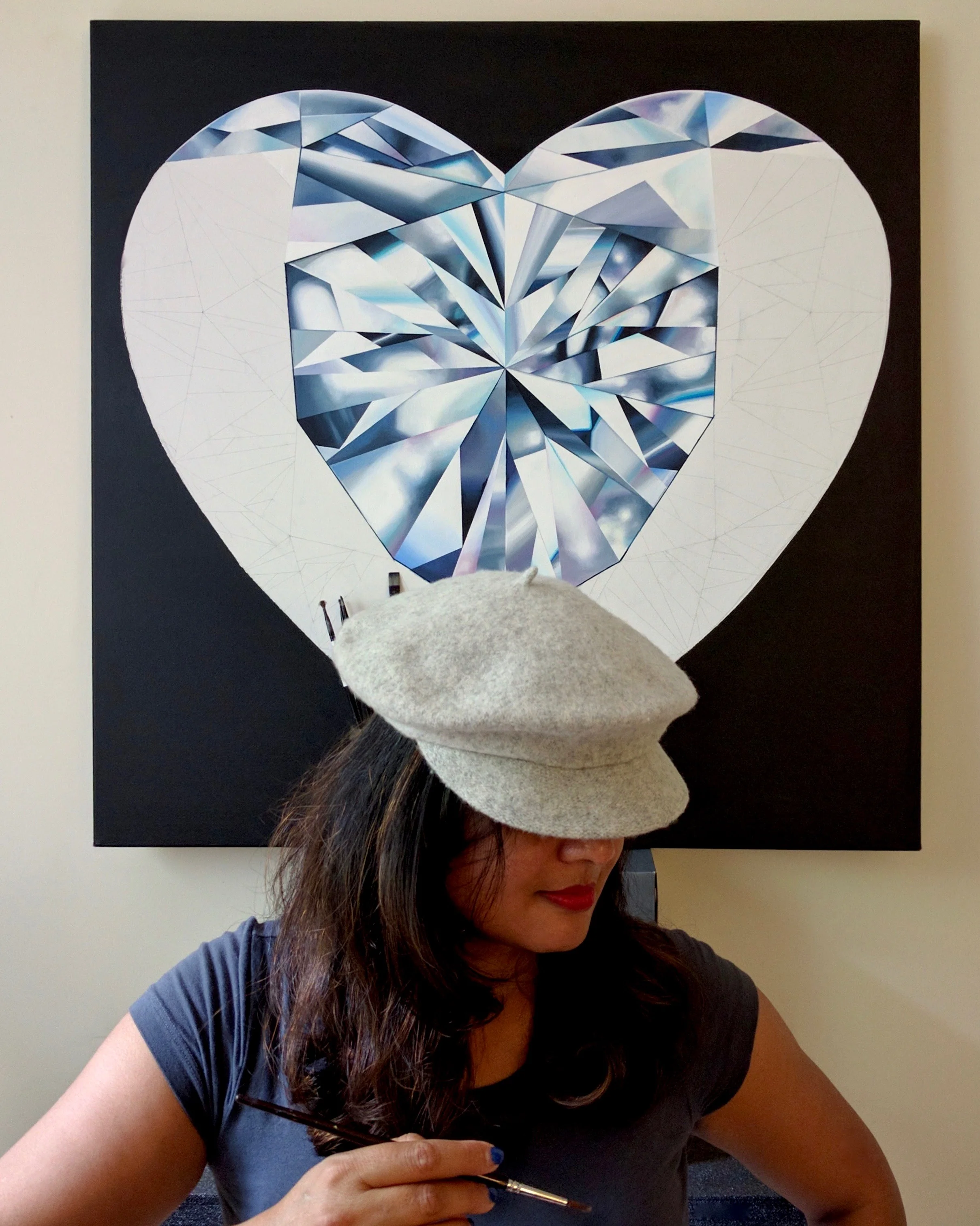 When your heart is in the right place. 'Pure Heart' white heart-shaped diamond painting in progress. Reena Ahluwalia in her studio. ©Reena Ahluwalia