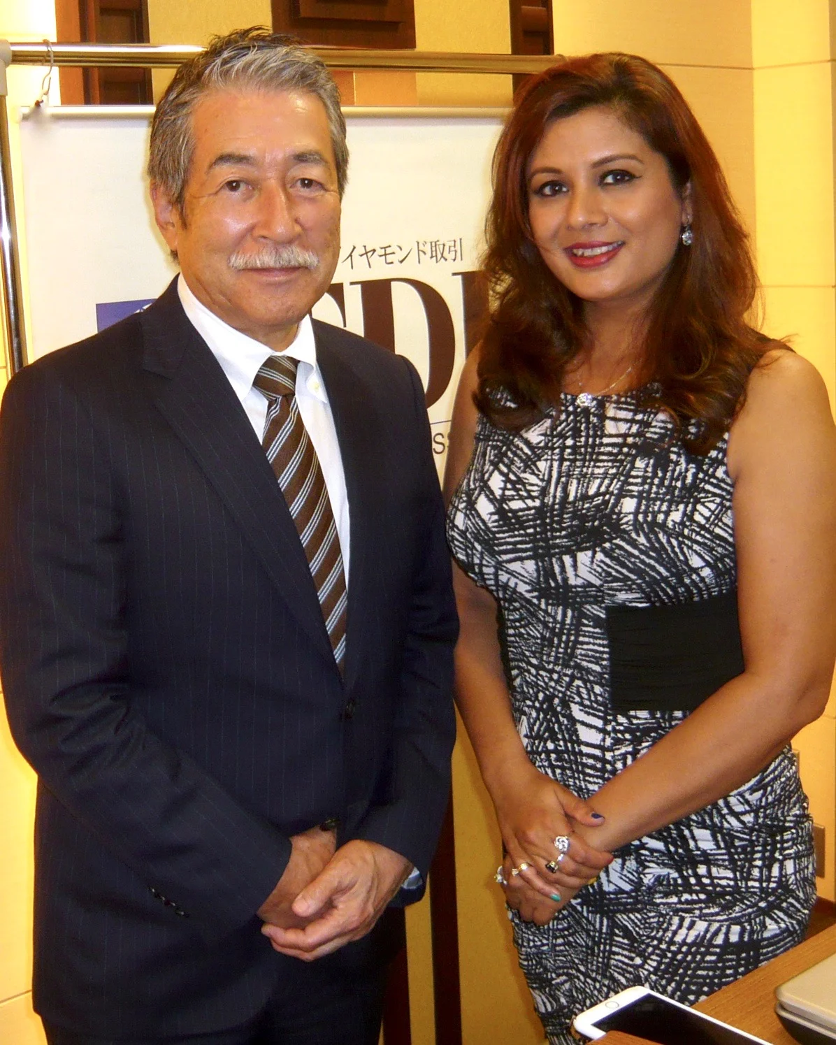 President of the Tokyo Diamond Exchange, Michio Iwasaki with jewelry designer, painter and professor, Reena Ahluwalia.