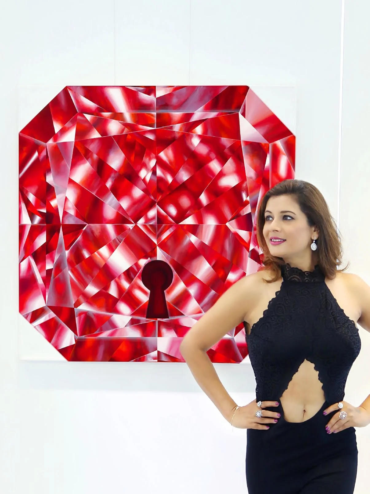 Artist Reena Ahluwalia with her Red Diamond Painting, titled ‘Unlock’. See Reena’s paintings here .