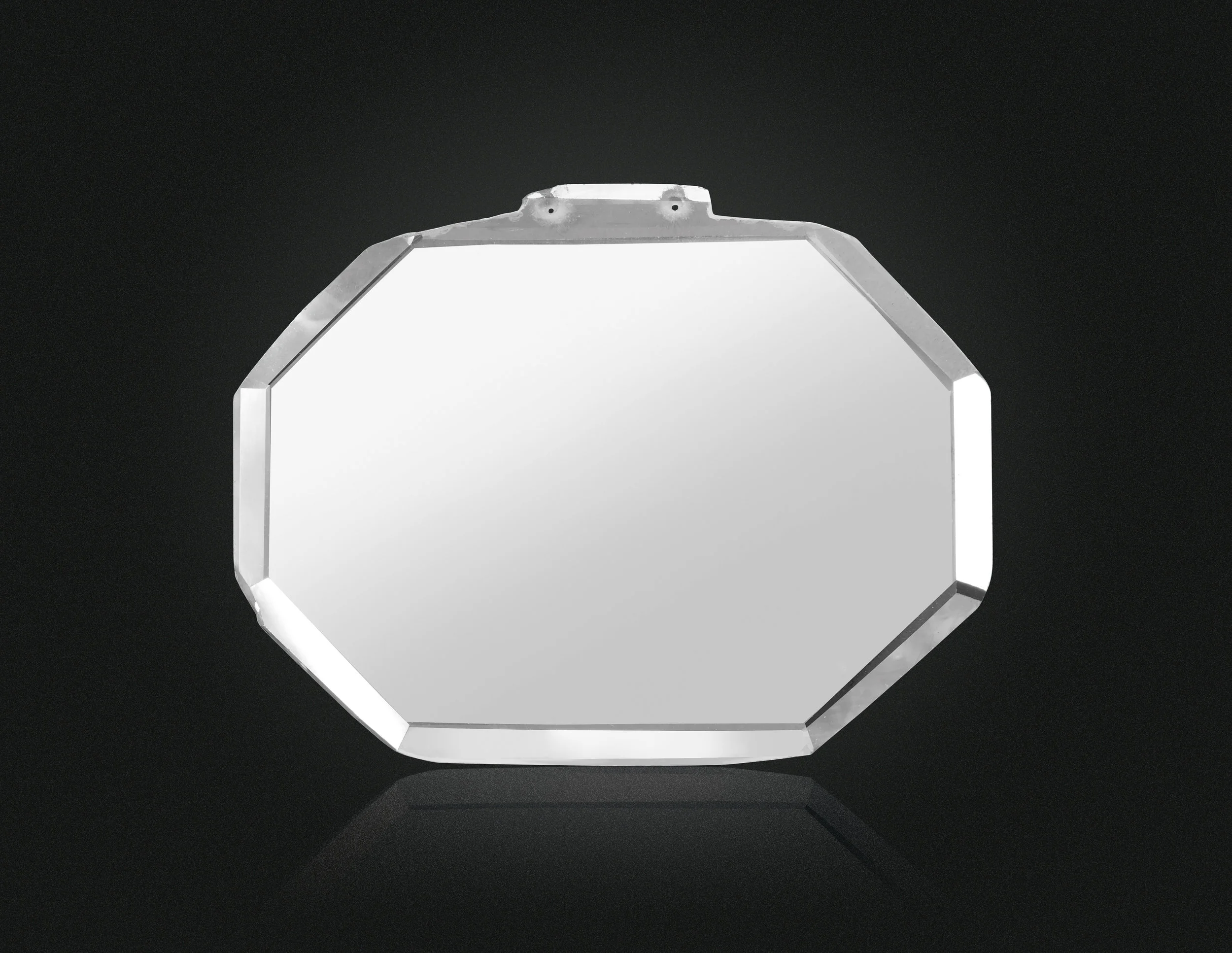 A Mughal cut-cornered rectangular portrait-cut Golconda diamond of 20.22 carats, Type IIa. The present diamond also exhibits a feature common in gems shaped for Mughal use, a pair of drilled holes by which a stone could be sewn to a turban or garment to impart both pomp and courtly fashion. Image: Christie’s. Portrait diamonds, also called lasques, are among the earliest cut diamonds preserved to this day. Extremely shallow, they consist of virtually nothing but two tables separated by a tiny row of girdle facets. They were sometimes used to cover miniature paintings and therefore came to be known as portrait diamonds. Due to their extreme flatness, they were unsuited for later recutting and their original shape was preserved, making them historically significant. Large portrait diamonds are extremely rare and among few famous examples is one seen on a portrait of Shah Jahan from 1616, where he holds a turban ornament set with an emerald and a portrait diamond or the ‘Russian Portrait Diamond’, dating around 1820, covering a miniature portrait of Czar Alexander I in a bracelet.