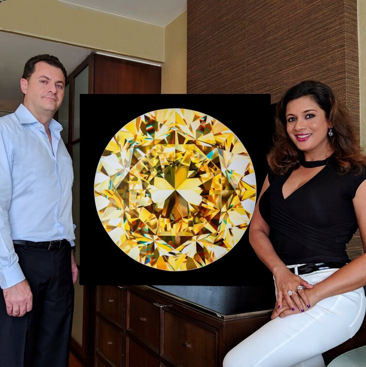  Fred Mouawad with Reena and her painting of the Mouawad Dragon Diamond. 