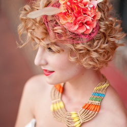 For a bit of neon spunk, get some inspiration from Elizabeth with her colored fascinator and birdcage veil