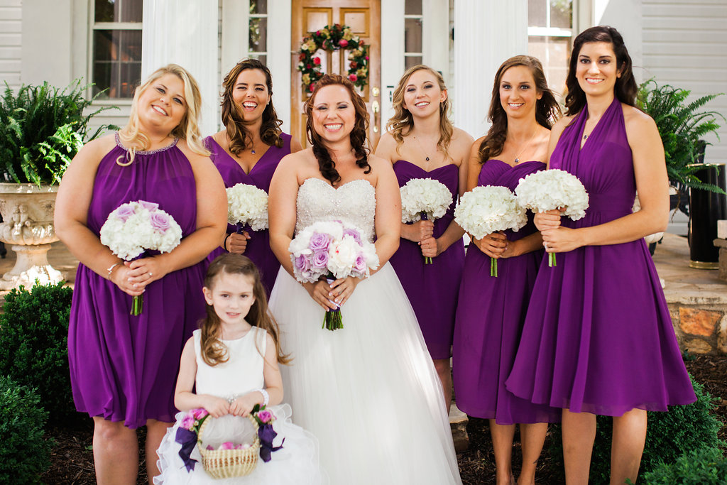 Bridal gown, bridesmaids, and flower girl dresses all purchased at Ellie's Bridal!