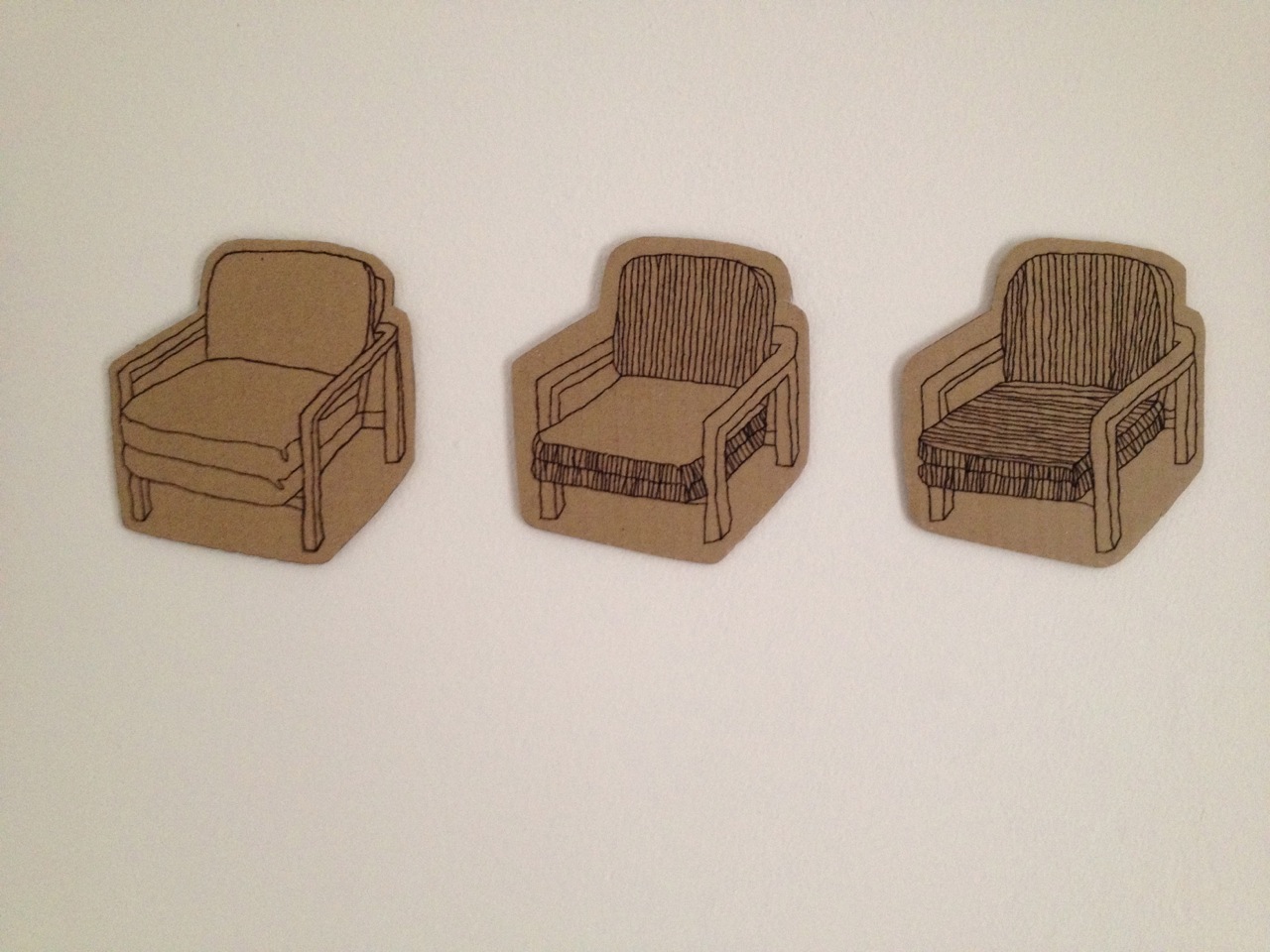Endlessly searching the pages of IKEA catalogues (hard copies and online) and redrawing many different options of chairs led Raffan to her work Grand comforter , 2010. Through a process of mimicking, duplicating and inverting these images she ponders and questions her ability to escape the western innate housewife syndrome; having no children, no husband and no home of her own, she questions 'why is she trapped herself?' By completing a series of three colour choices, each with an additional three pattern choices in each, they are presented like beefed up versions of an iPhone's shopping cart, ready to deselect, shuffle and reselect again. Paired with untitled (papoose) , 2010, Grand comforter presents the crazed conversation about the ease of online shopping and selecting comfort from your lounge room chair or la-Z-Boy; whilst untitled (papoose) , ponders the alternate question of how does one feel long term comfort? Images of being wrapped as a child, tucked away in bed, cuddled by another or even nestled on a soft cushion? The artist pairs the emotive comparison with a now beyond learned, innate behaviour, can we feel comfort without buying?