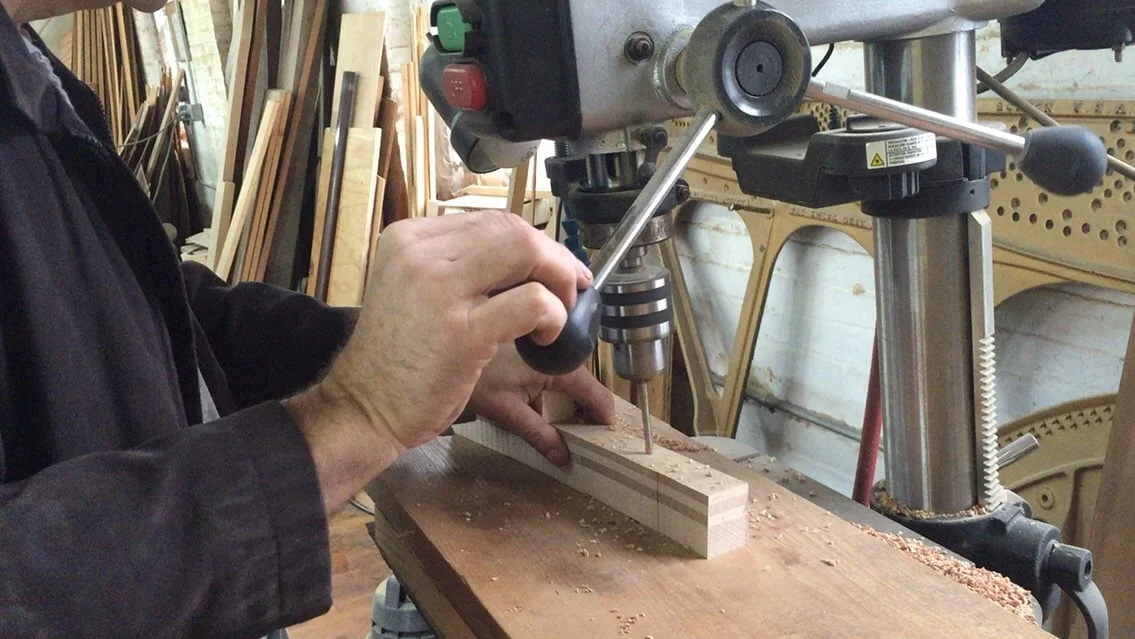 Demonstration of making hole to pin block