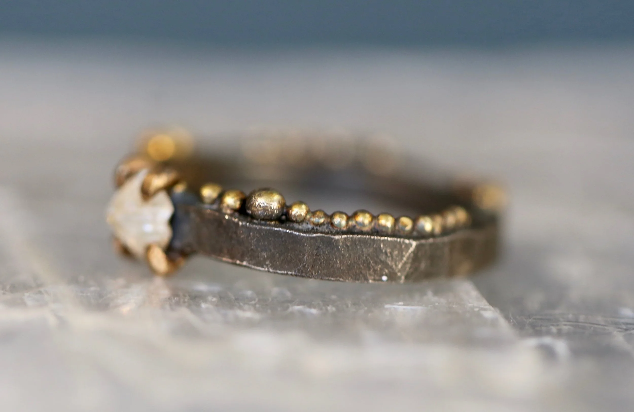 Sawn Octahedron Rough Diamond on a Granulated Band