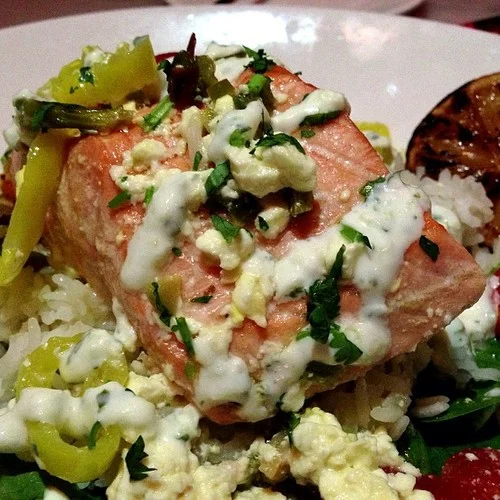 Tomatoes, feta, olives, jalapenos, banana peppers, cilantro, spinach, chardonnay, extra virgin olive oil, jasmine rice & tzatziki