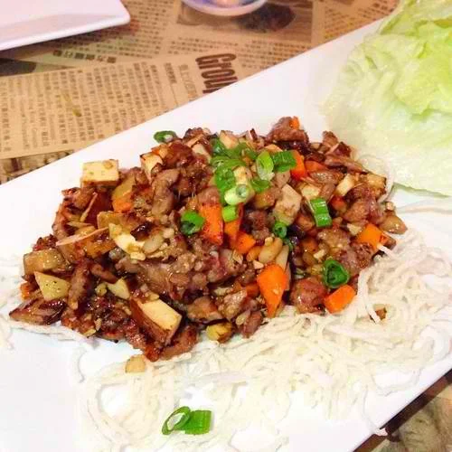 Crisp lettuce cups filled with stir fried mushrooms, water chestnuts, carrots, bean curd, garlic, ginger and your choice of protein 