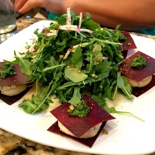 Cashew ricotta, pistachio-arugula pesto, pear-lime sauce, arugula side salad