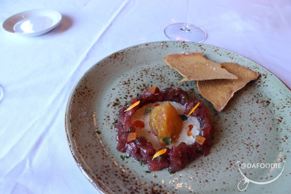 Cold Smoked Tuna Tartare. Tonatto sauce, confit tomatoes, mint, sesame oil, bottarga, crispbreads.