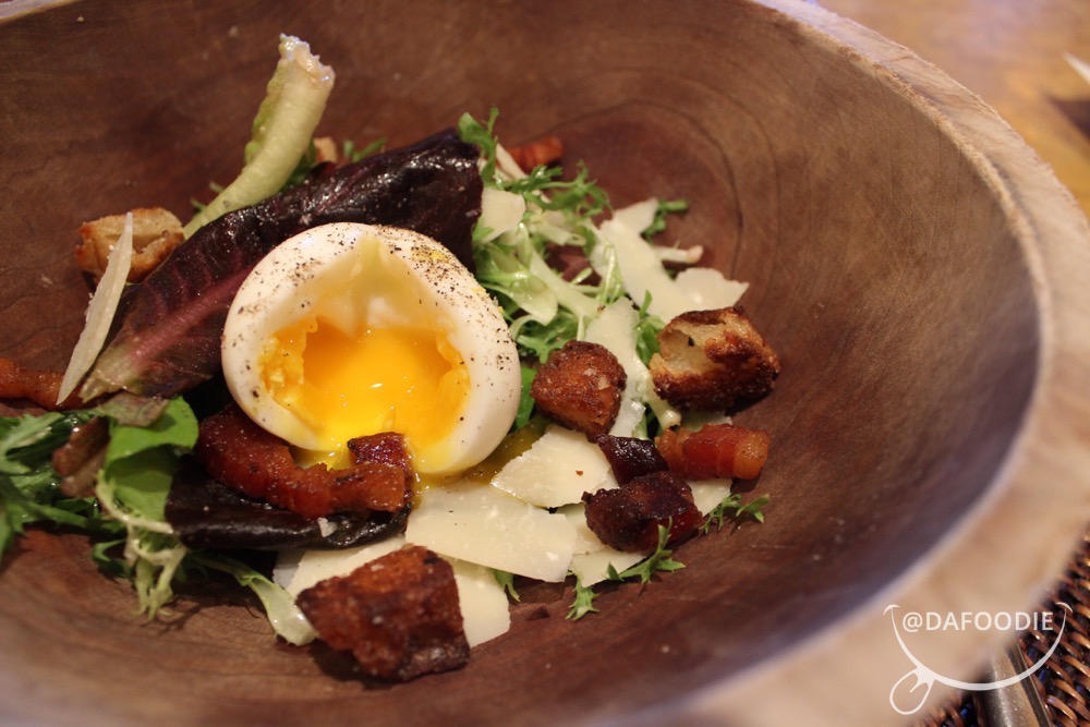 Farmer Salad. Primo lettuces, garlicky levain croutons, house cured bacon, soft poached egg, white balsamic vinaigrette.