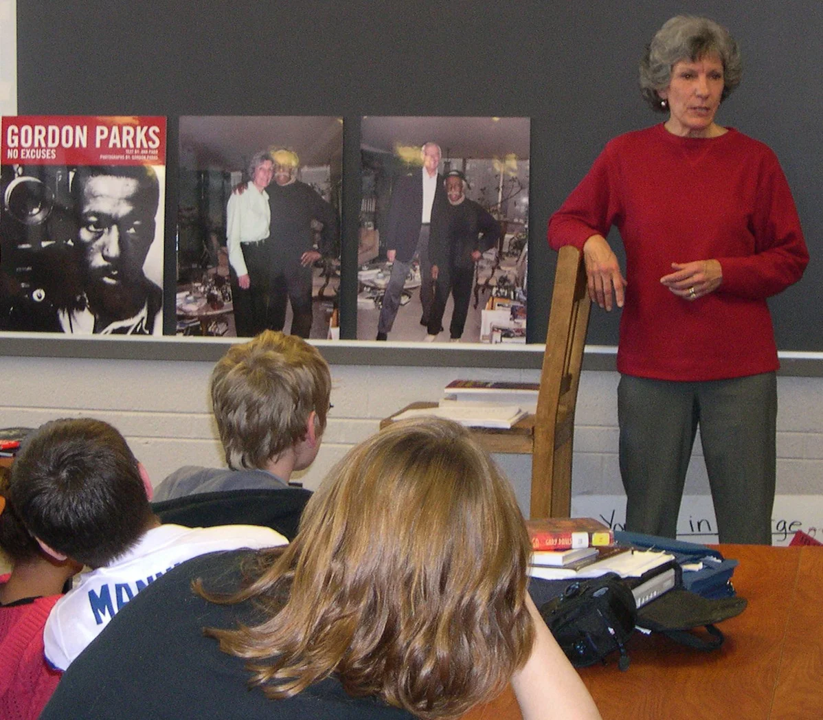 Author Ann Parr talks to middle school students about Gordon Parks . She tells them about visiting with Gordon in his New York City apartment .