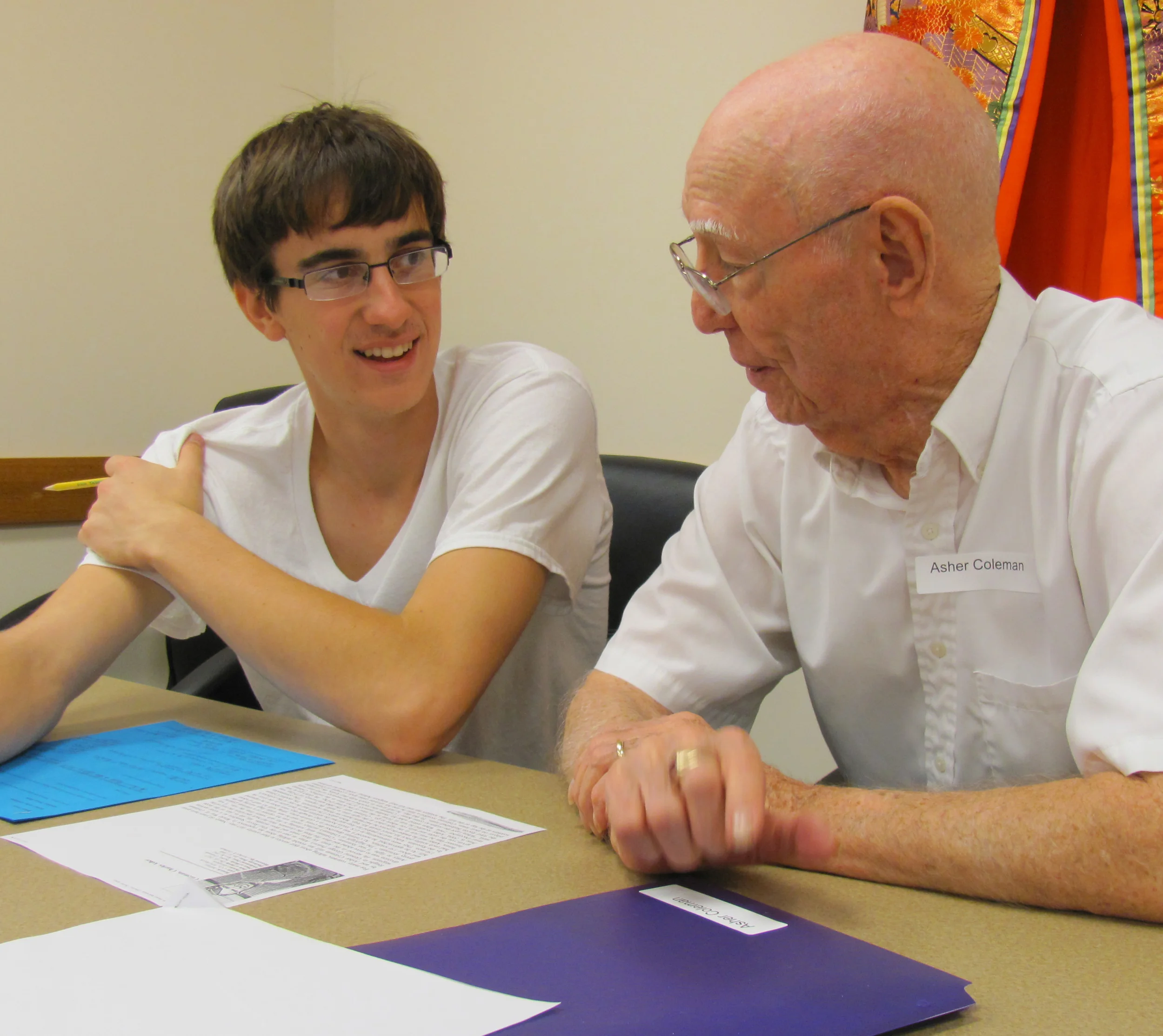 World War II veterans team with high school students to create a collection of nearly-forgotten stories. This veteran has recently passed away, and his high school partner served as a pall bearer. They adopted each other as grandfather and grandson.