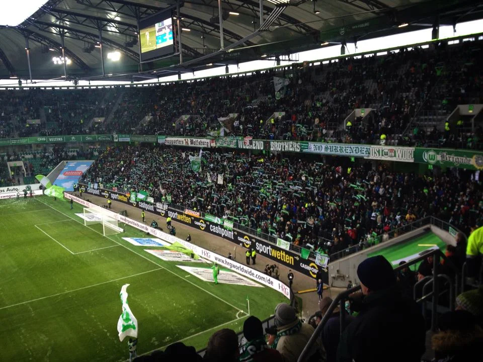 The Supporters of VfL Wolfsburg. Notice all of the Supporters signs.