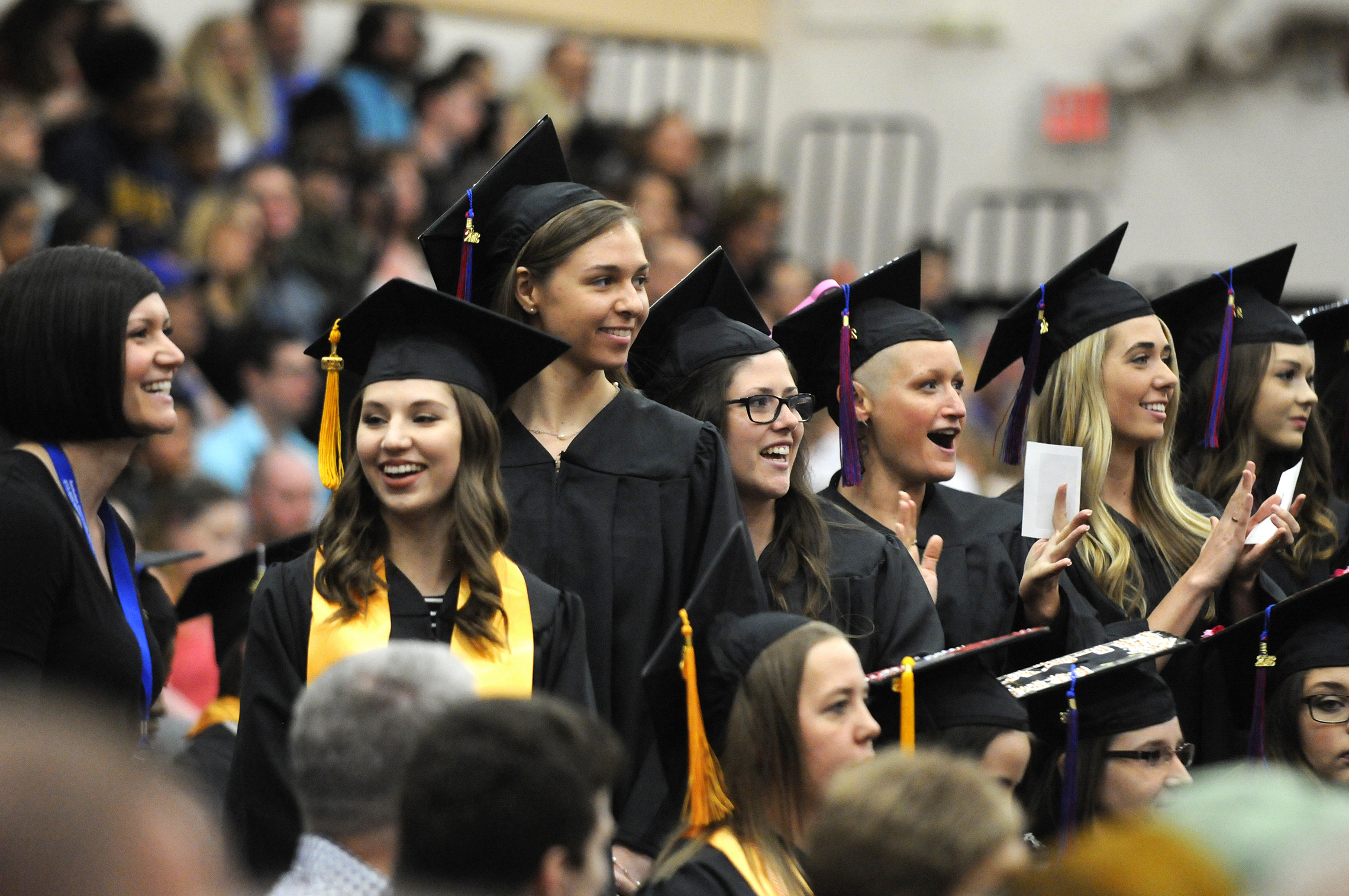  Physical Therapist Assistant students cheer for their fellow graduates Saturday during the Kankakee Community College graduation ceremony. 
