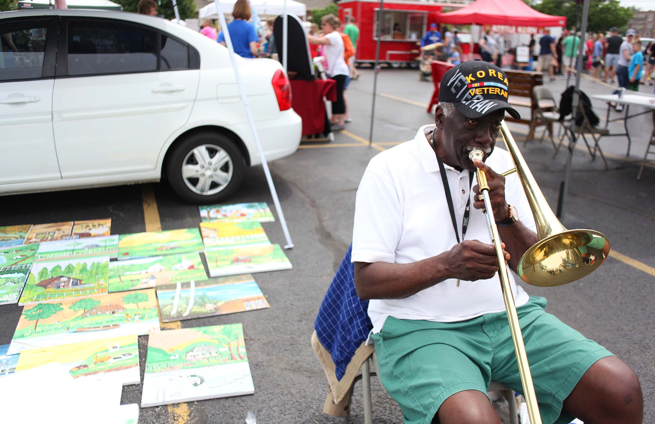  Willie Dixon, of Kankakee, plays the trombone Saturday during the Kankakee Farmers Market in downtown Kankakee. Dixon, a renaissance man, is a painter, playwright and musician. He grew up on the South Side of Chicago and grew to appreciate the impor