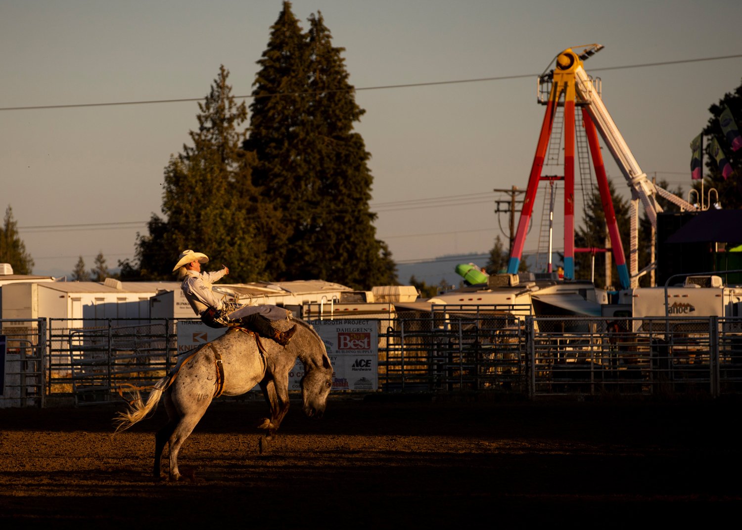  A rider competes in the bareback bronco riding event Saturday during the Columbia County Fair and Rodeo in St Helens, Ore. 