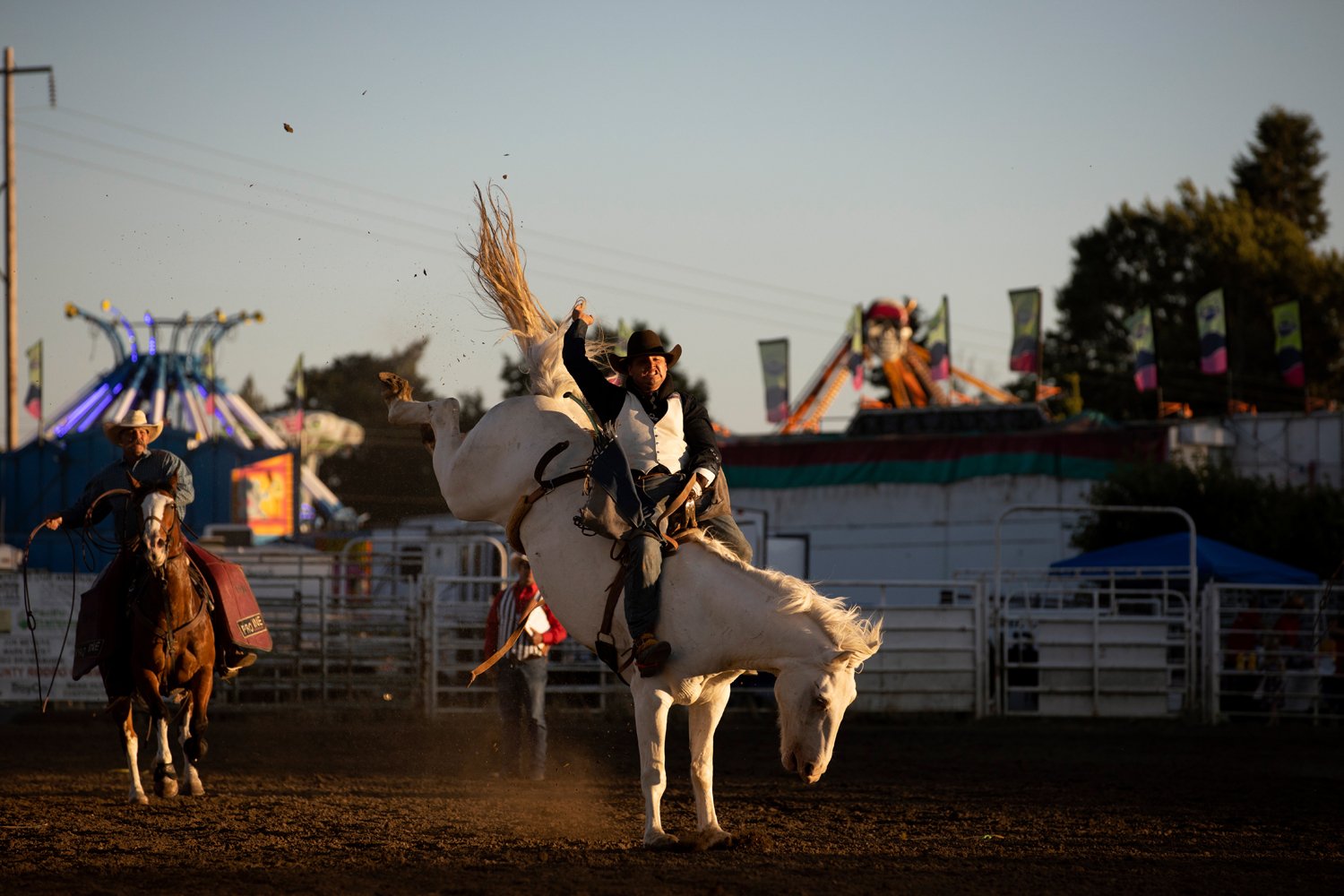  Hunter Greenup, of Lexington, Ore, competes in the bareback bronco riding event Saturday during the Columbia County Fair and Rodeo in St Helens, Ore. He participated in the events overseen by the Northwest Pro Rodeo Association, the largest regional
