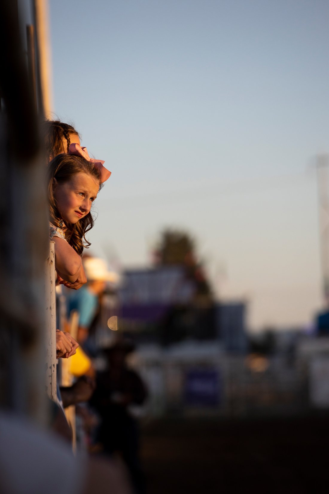  Young fans wait for the next event to start Saturday during the Columbia County Rodeo in St Helens, Ore. 