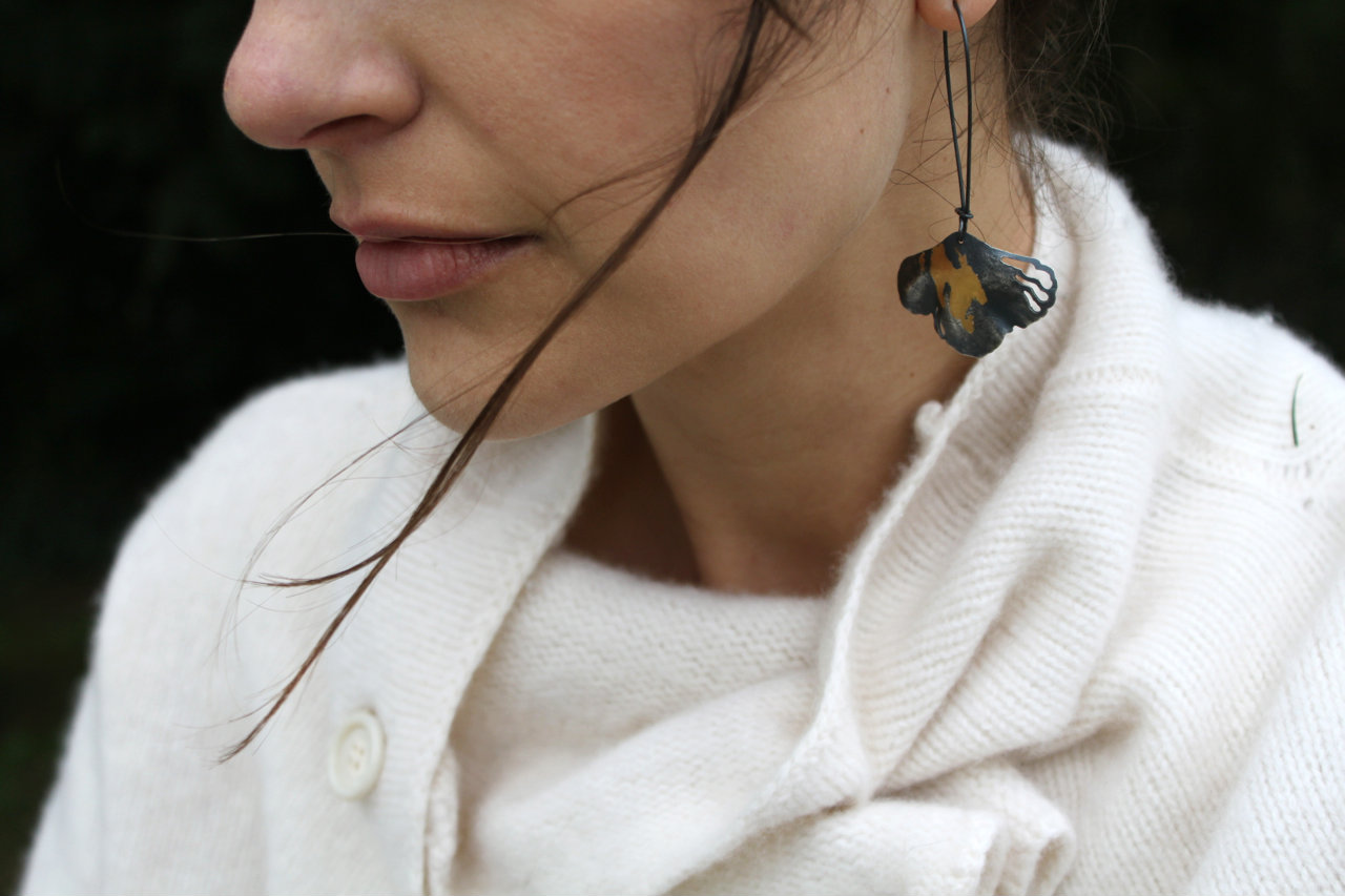 Puhpowee Earrings (sterling silver and 23.5 karat gold)