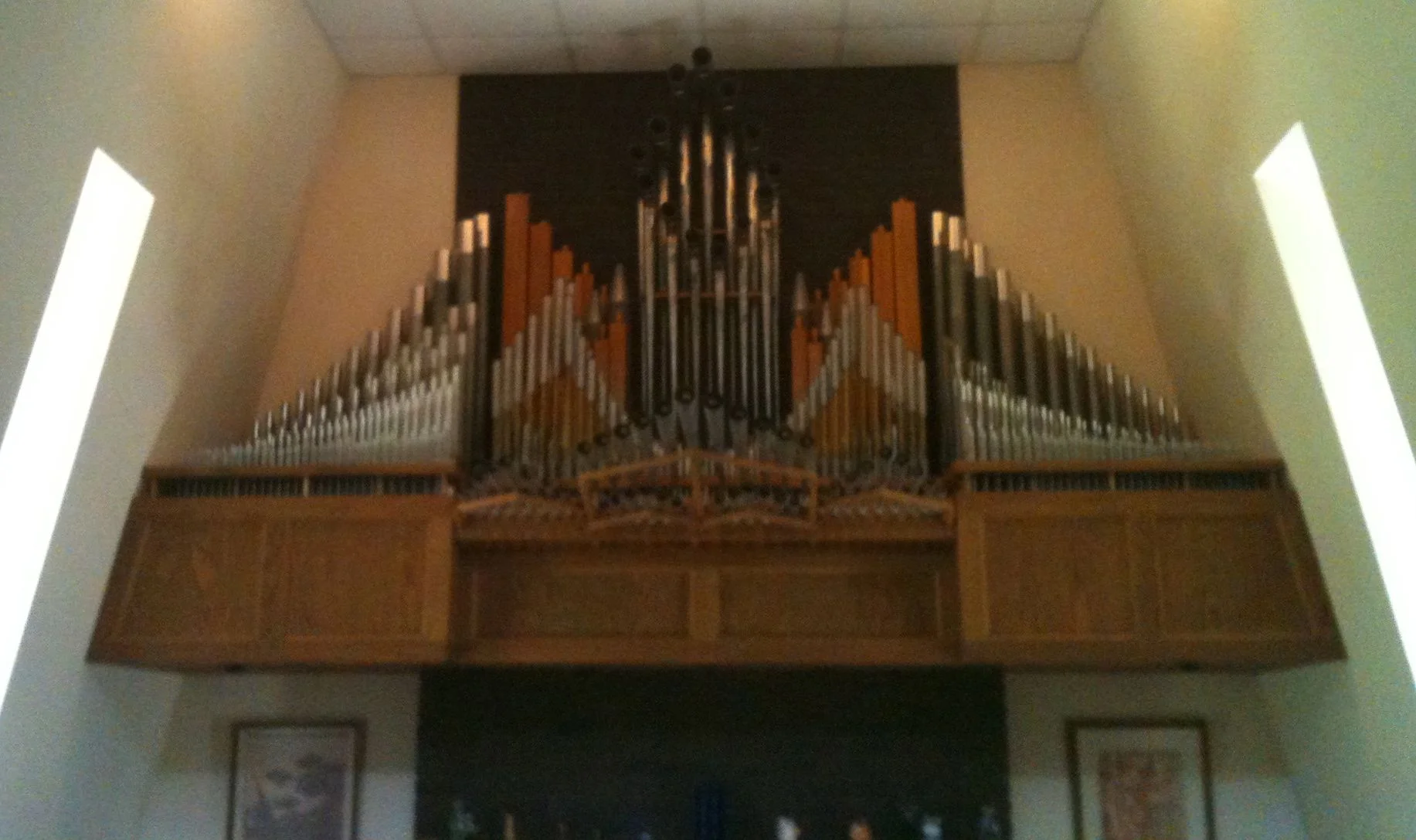 These are the pipes that would play during a fanfare (bugle and horn sounds), which protrude from the fireplace surround.