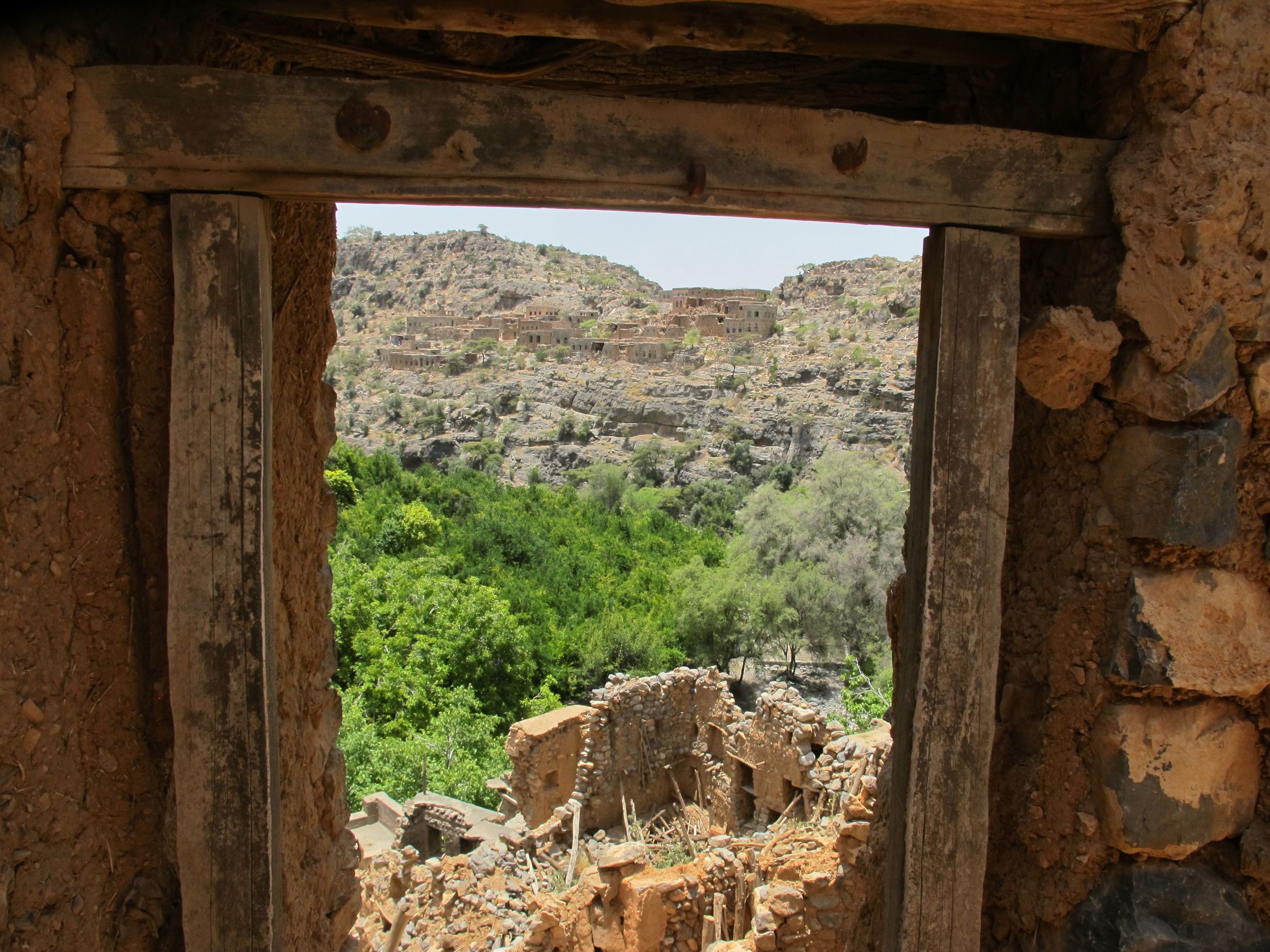 Standing in one abandoned village, looking across the valley at another.