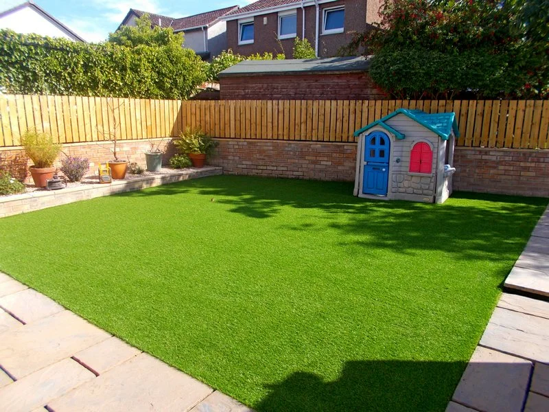kids back graden play grass.jpg