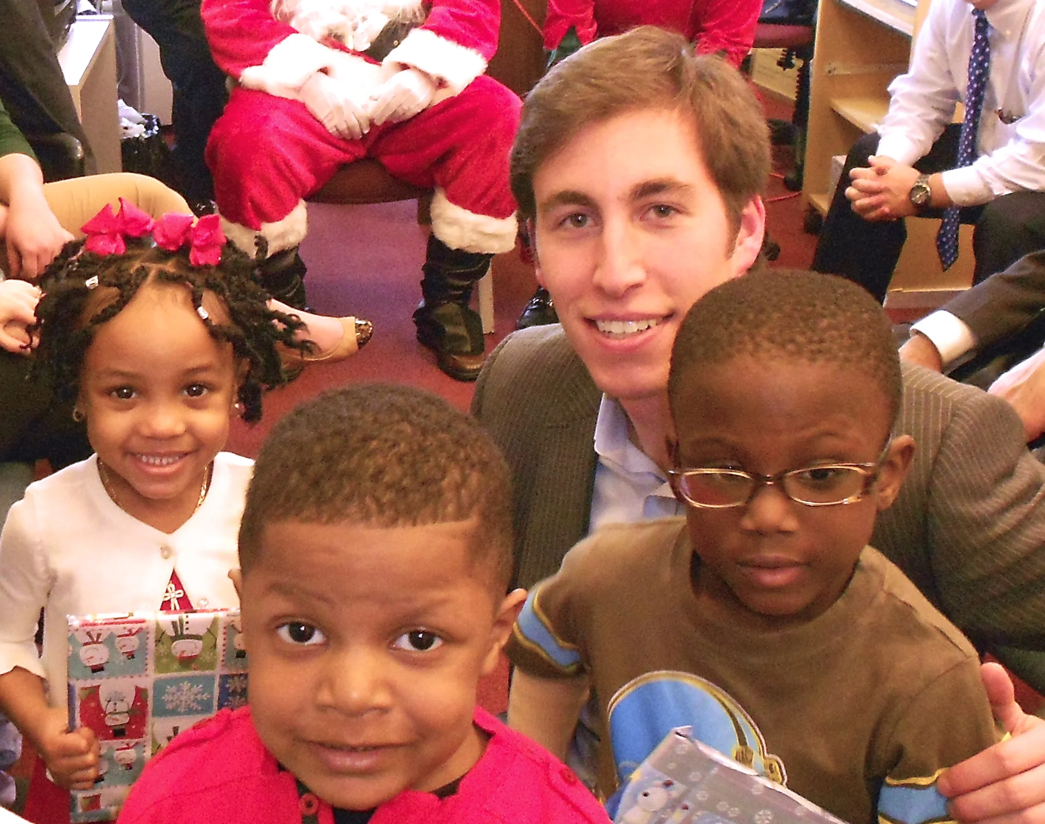 League Board Member, George Ricciardelli, with JFTN preschool children.