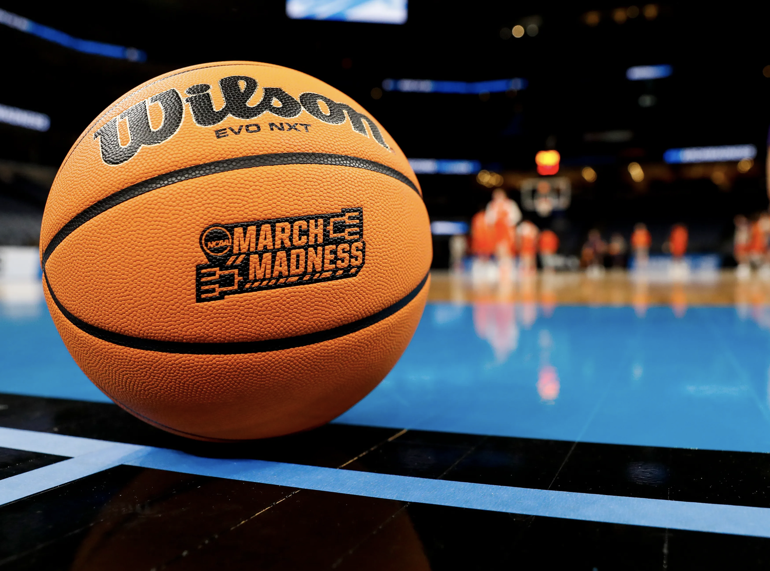 NCAA March Madness basketball on court