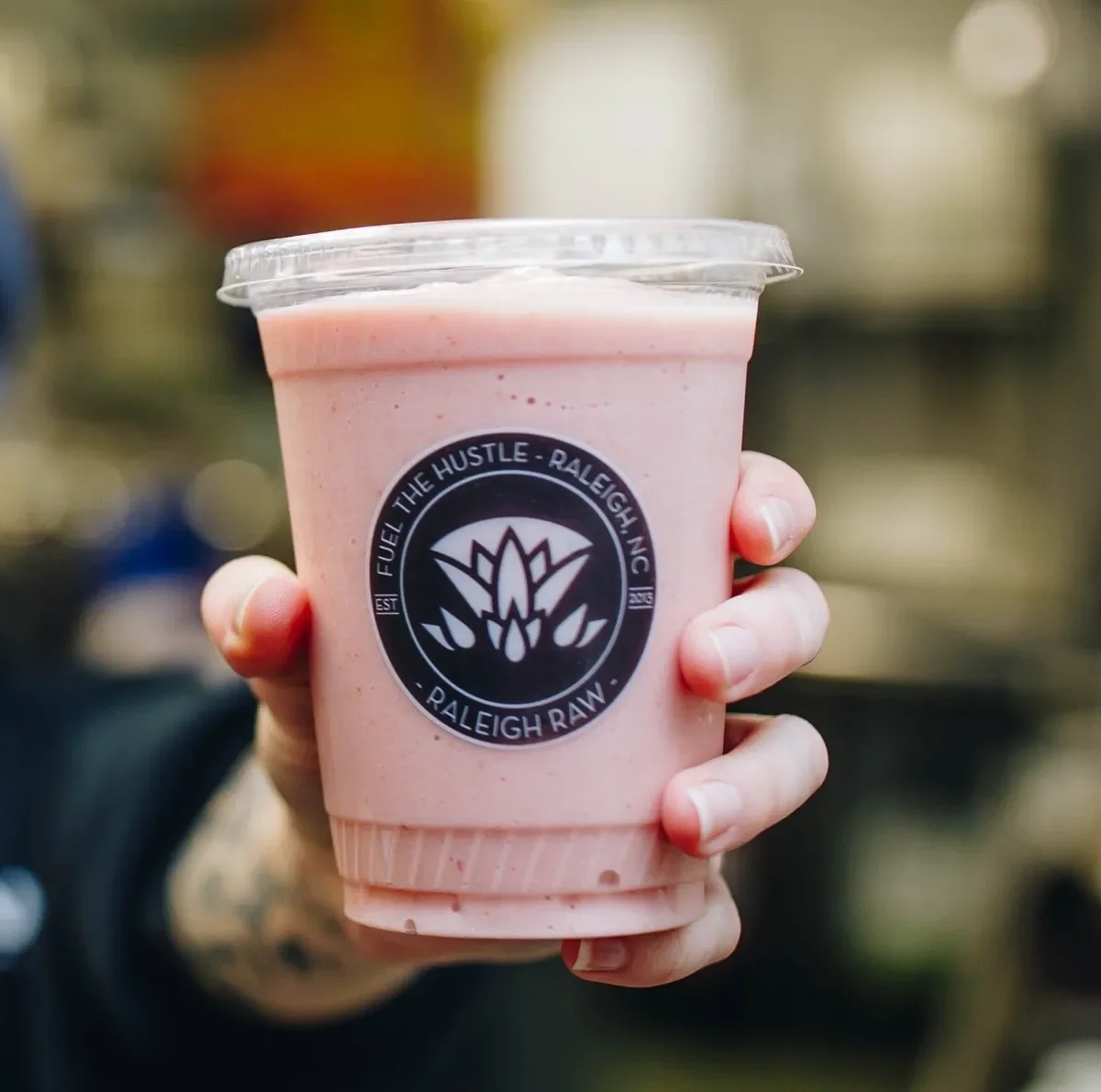 The Kid’s Tropical Smoothie at Raleigh Raw blends orange, banana, strawberry, and almond milk into a creamy, refreshing drink. A kid-approved, naturally sweet smoothie packed with vitamin C and whole-food goodness for littles (and adults).