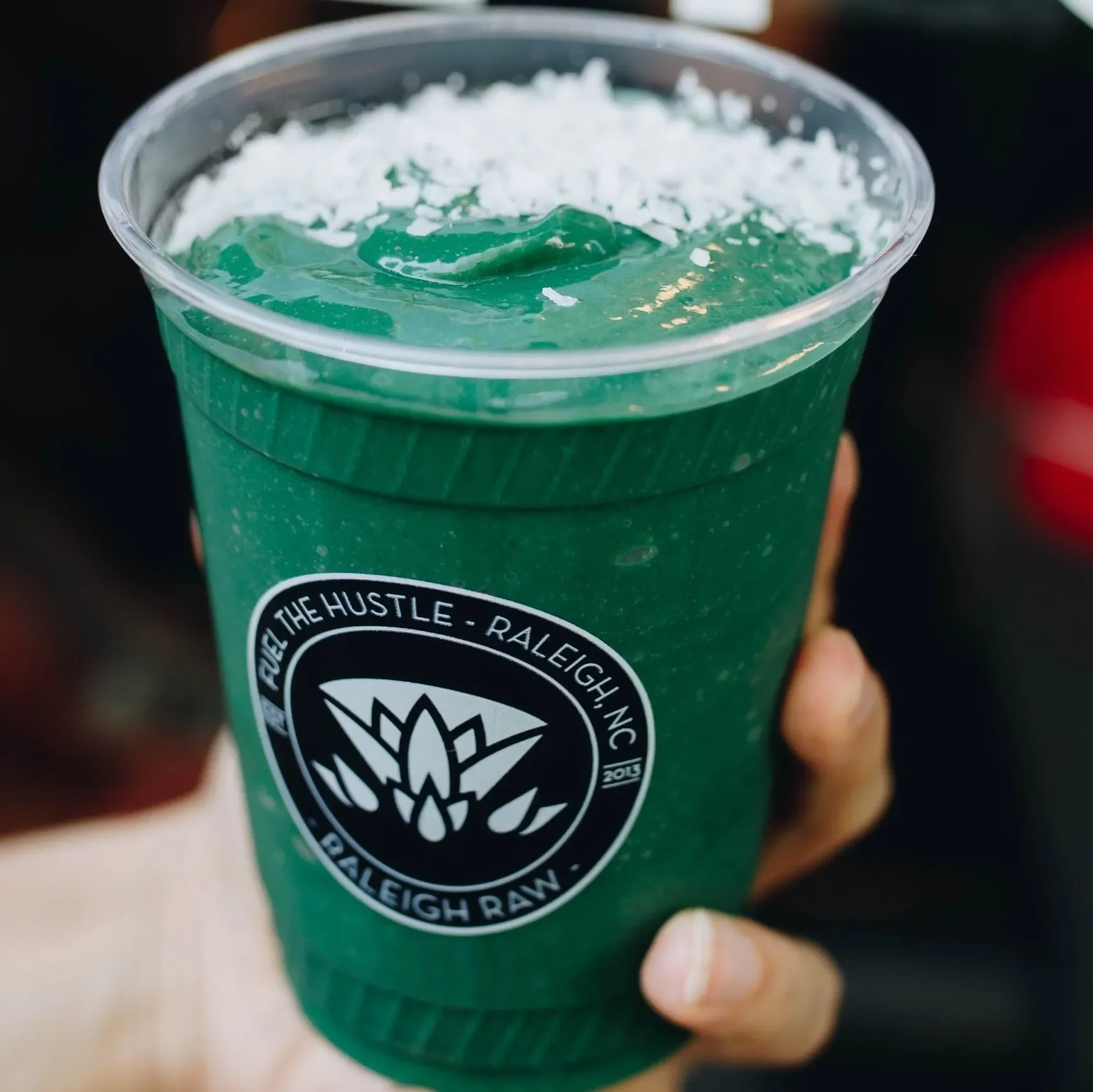 Raleigh Raw’s Green Smoothie blends mint green tea, avocado, spinach, mango, spirulina, lime, and dates for a creamy, nutrient-rich boost. Naturally energizing and detoxifying, topped with coconut flakes for a refreshing finish.
