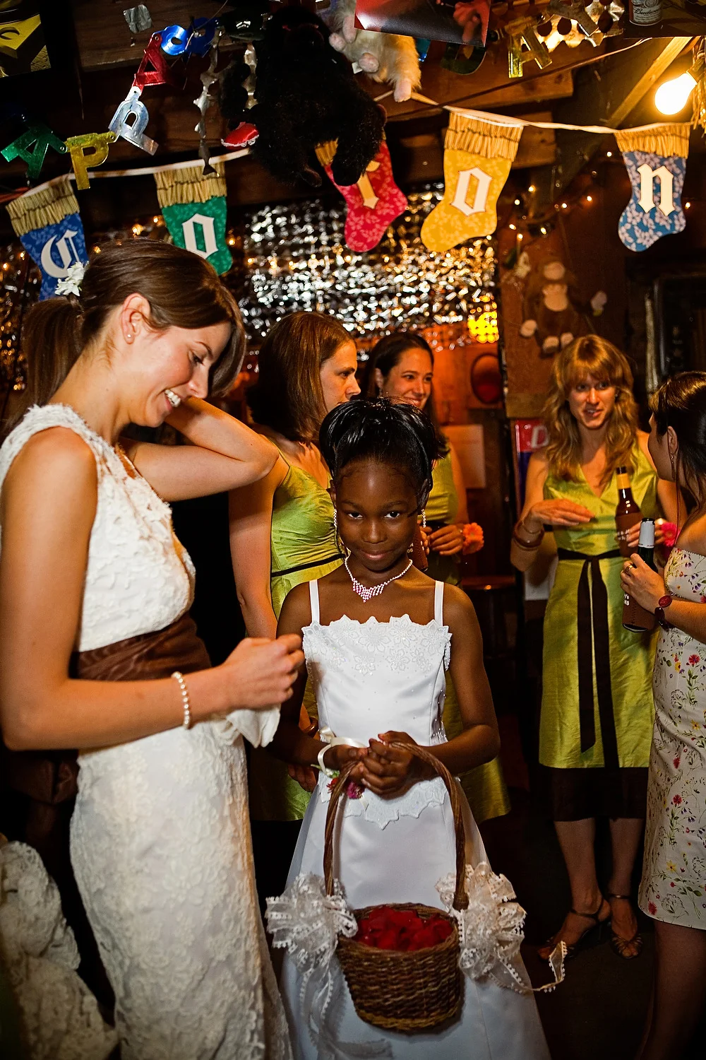 Kate, the bride (left), with Seaberry's granddaughter, an attendant in the wedding (inside the juke joint prior to the start).