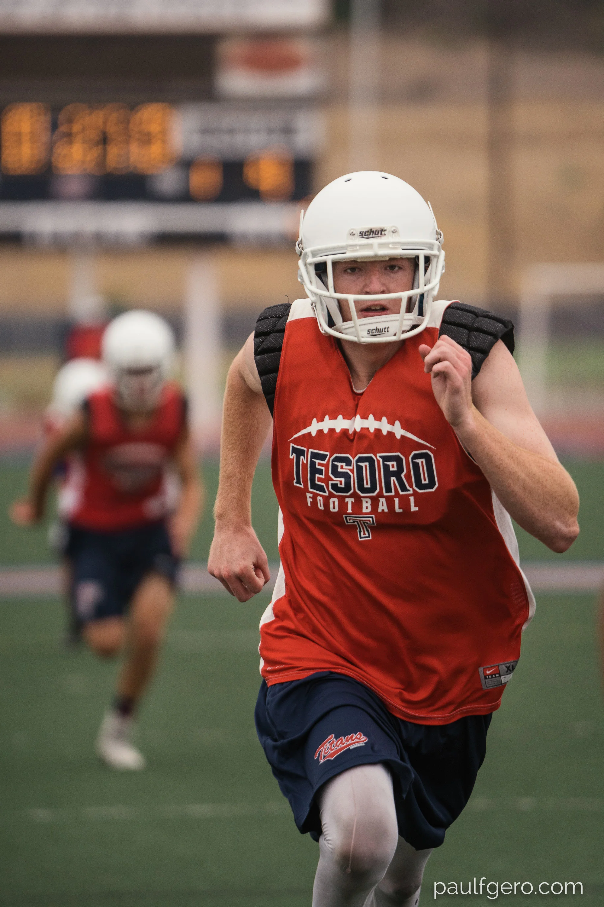 Tesoro players run during Day One of Fall Camp at the school on Monday. 200mm, 400 ISO, 1/100 0th at f2.8.