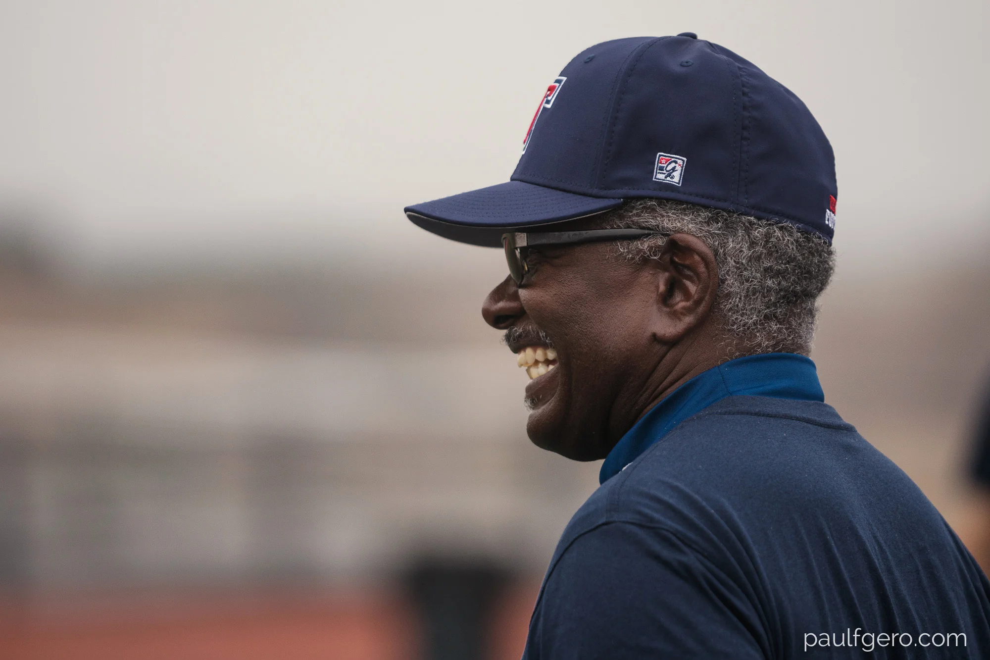 Tesoro assistant coach Al Nichols smiles during Day One of Fall Camp at the school on Monday. 200mm, 400 ISO, 1/100 0th at f2.8.