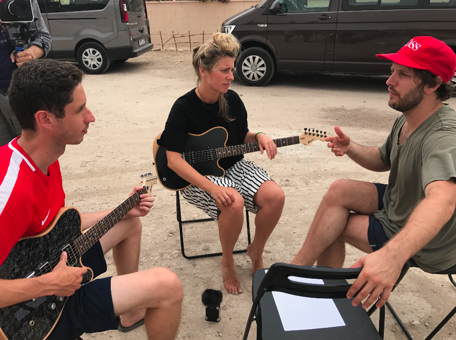 Marit de Jong (center) Getting Lessons From Jason Barrows (right). &nbsp;Pictured with her Moniker Rival Series Guitar.