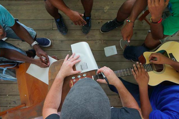 Joshua of Midnight 30 Music teaching in Belize with Guitars For Glory, 2016.